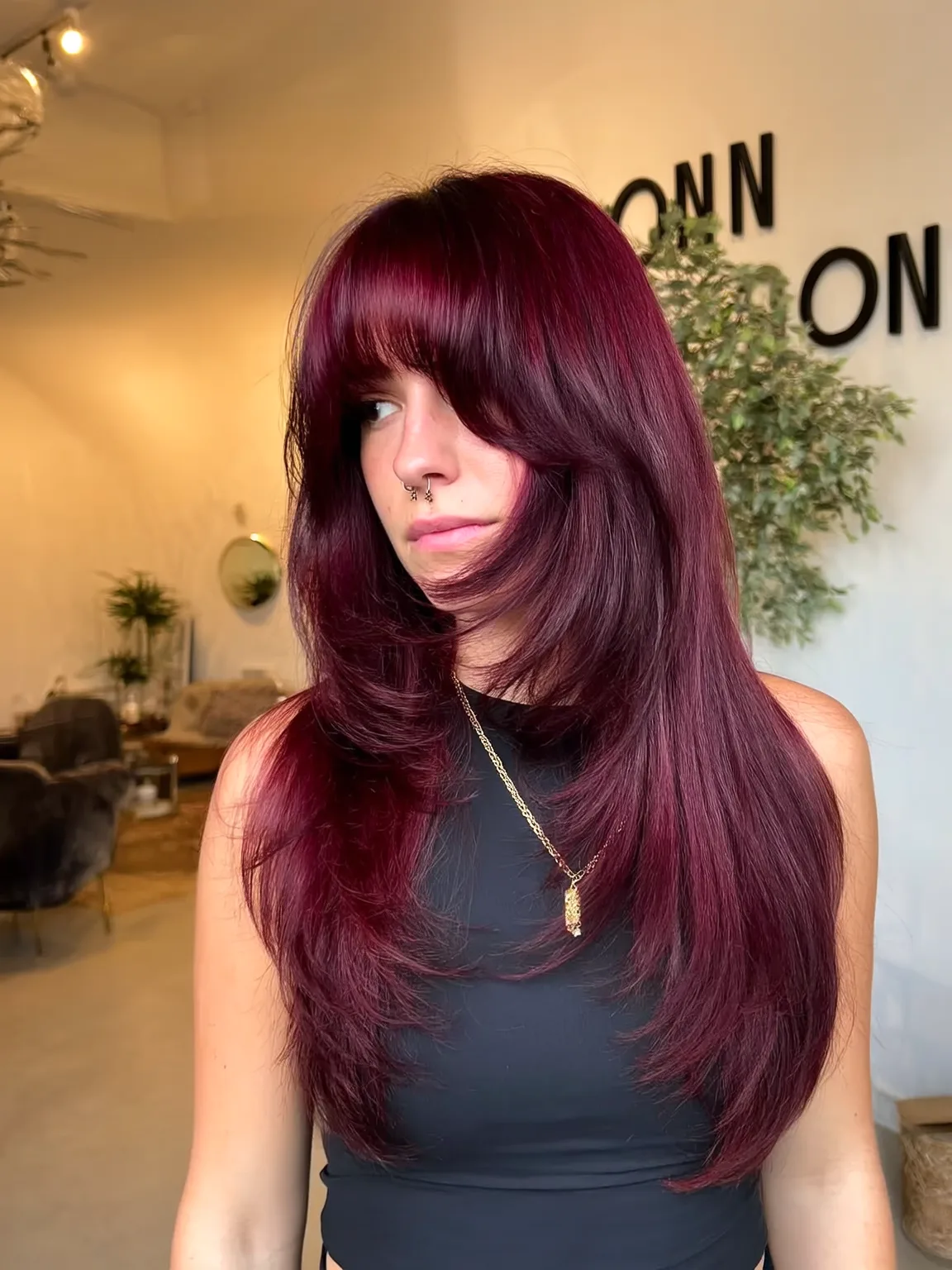 Rich Burgundy Plum Long Layers with Curtain Bangs